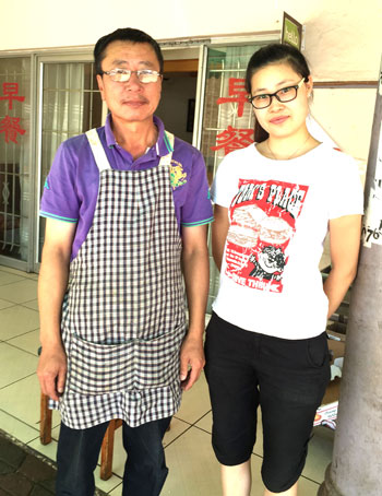 The chef and owner of Chinese Northern Foods with his daughter. Photo courtesy of Hennie Fisher.
