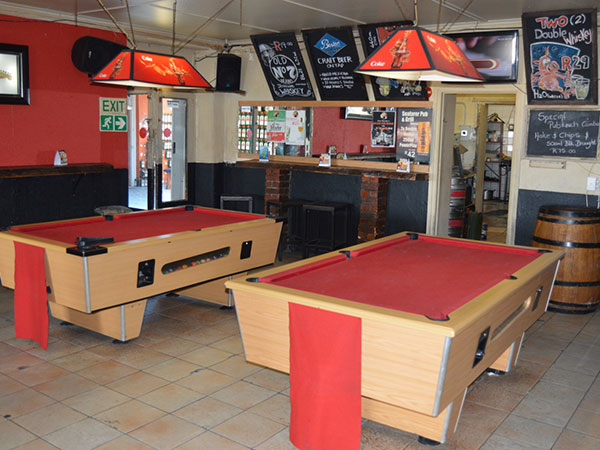 The pub is split into three sections, with pool tables for the competitive. Photo by Greg Landman.
